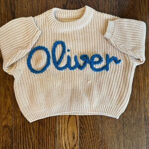 Embroidered “Oliver” Beige Sweater with Blue Lettering